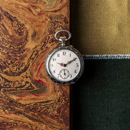 Montre de poche huguenin frères