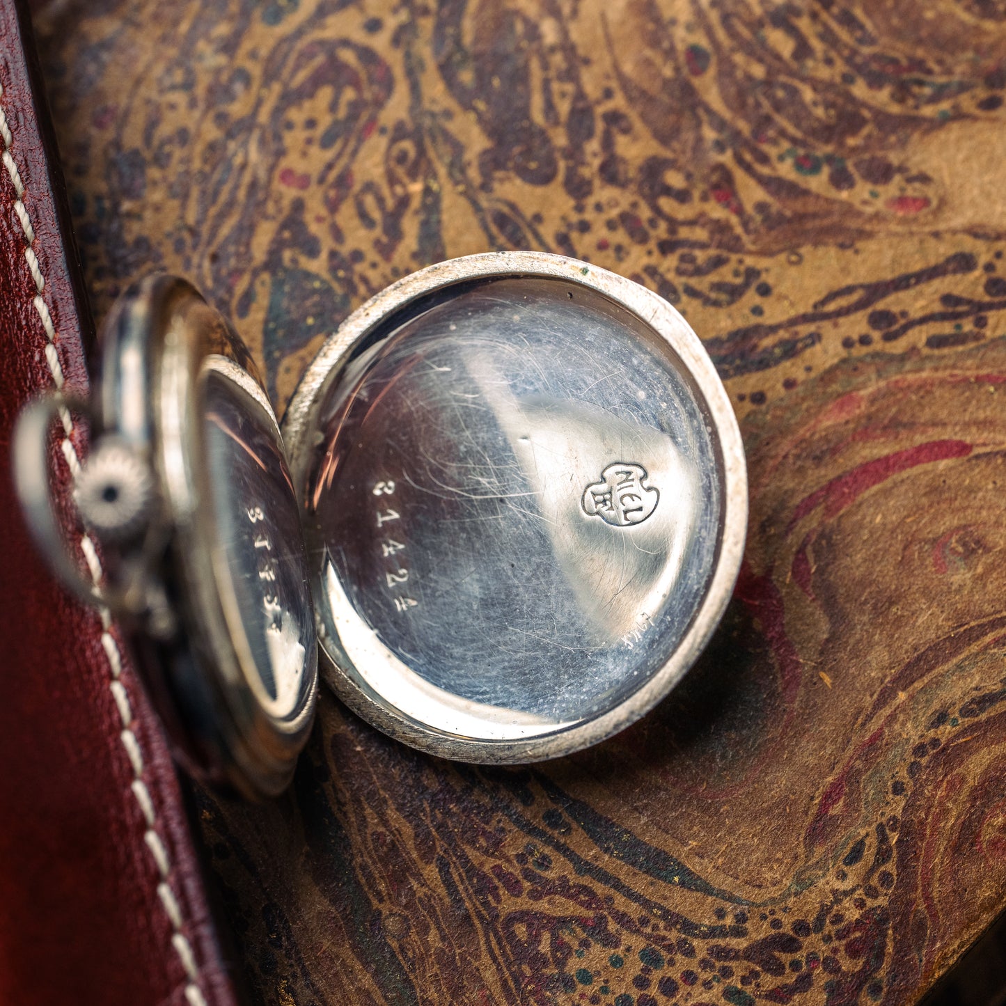 Montre de poche huguenin frères